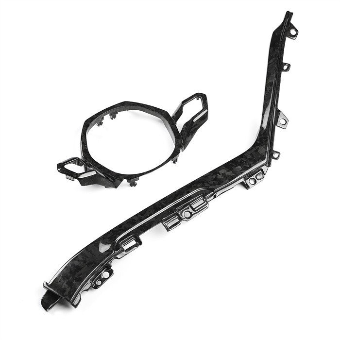 Parti in fibra di carbonio forgiate